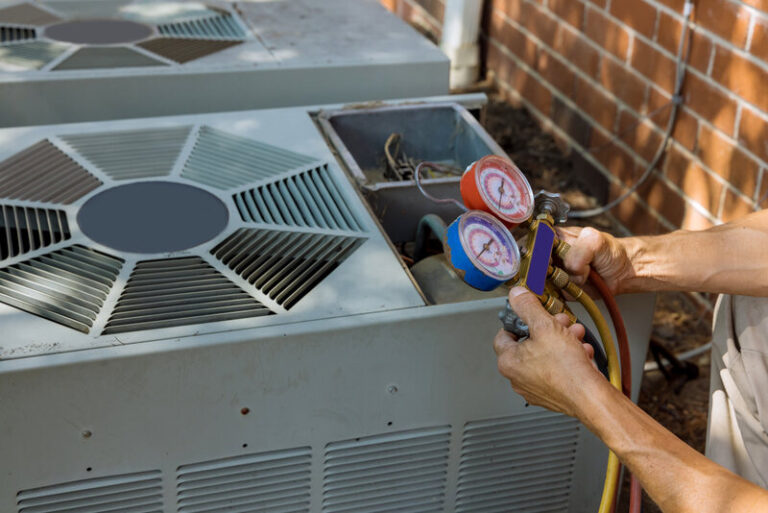 Air conditioning repair technicians working on HVAC equipment